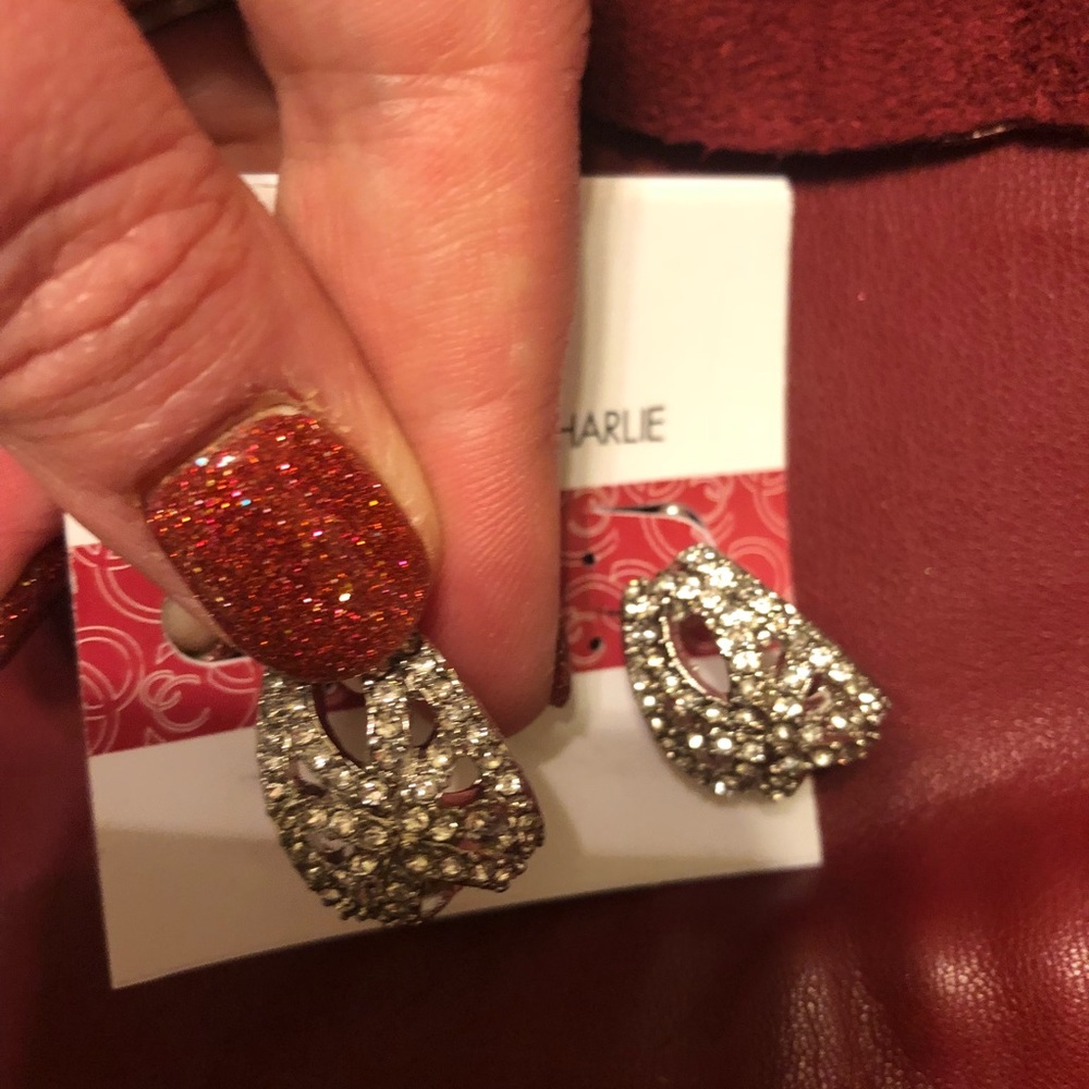 Sparkling silver earrings by Charming Charlie